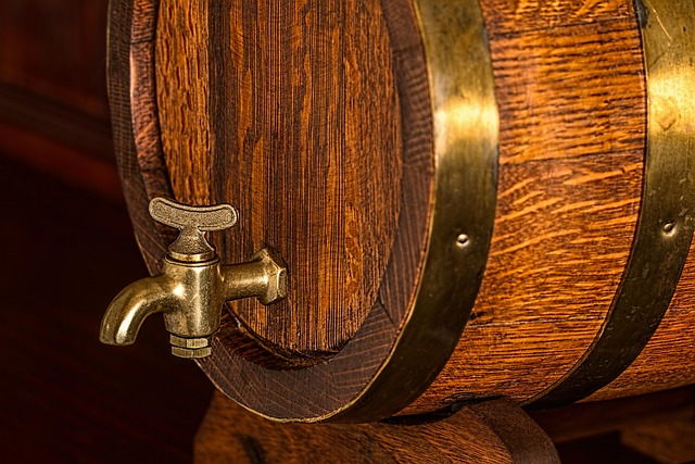 Elena Mirador inspecting a barrel in the cellar